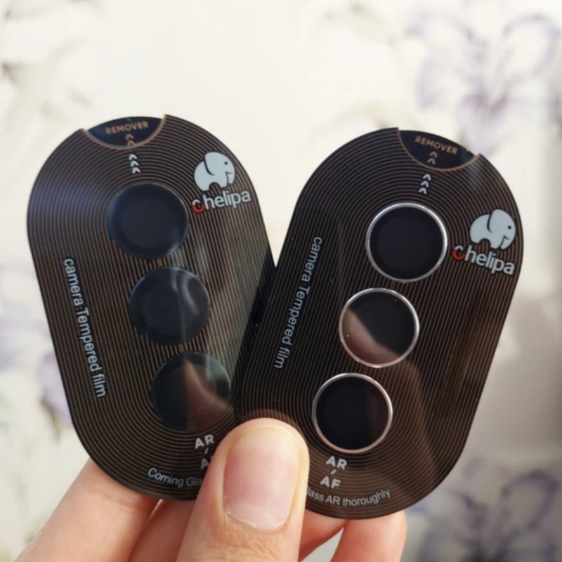 محافظ لنز دوربین شیشه ای اوجی مدل chelipa titanium مناسب برای گوشی موبایل سامسونگ Galaxy S24 FE