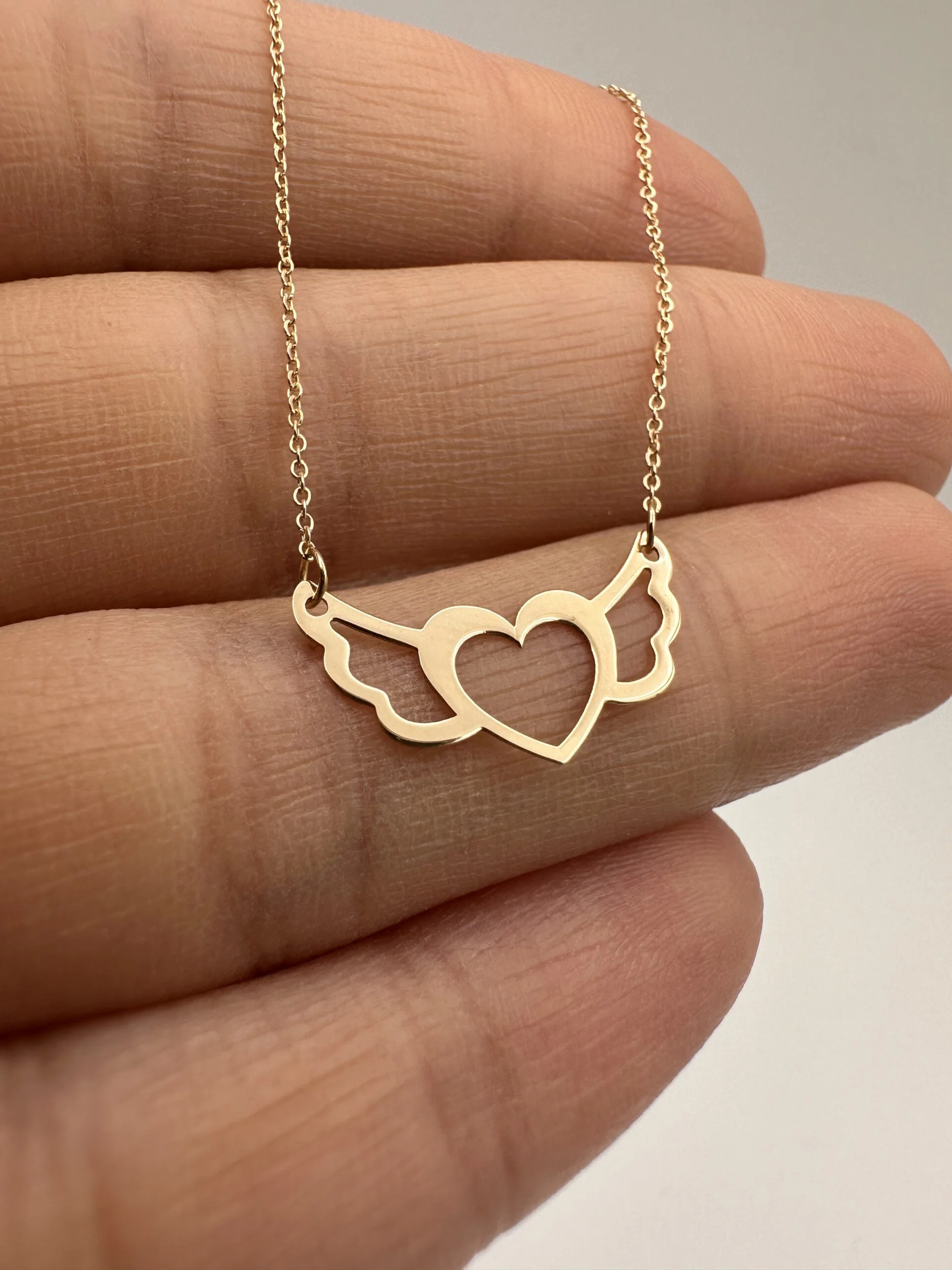 گردنبند طلا 18عیار اپال گلد مدل قلب بال فرشته گردنبند طلا 18عیار اپال گلد مدل قلب بال فرشته