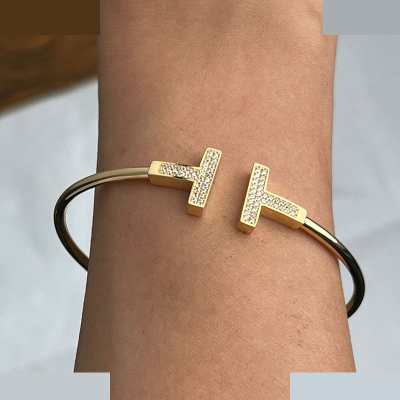 بنگل طلا 18 عیار زنانه ماوی گالری مدل تیفانی نگینی تاینی بنگل طلا 18 عیار زنانه ماوی گالری مدل تیفانی نگینی تاینی