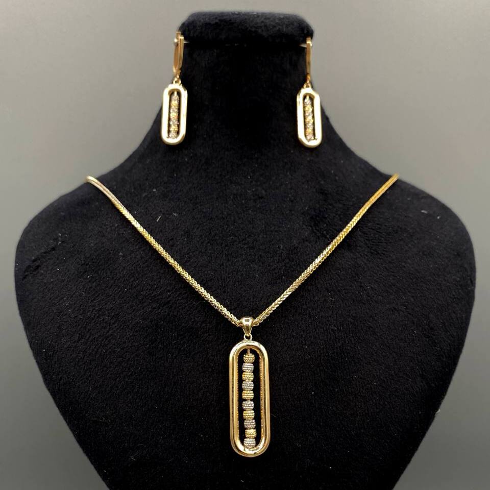 نیم ست طلا 18 عیار زنانه ترکیب گوی سفید و طلایی آویز و گوشواره لاوندر کد 531 نیم ست طلا 18 عیار زنانه ترکیب گوی سفید و طلایی آویز و گوشواره لاوندر کد 531