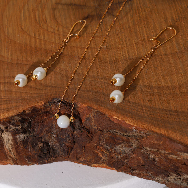 گوشواره عصایی طلا 18 عیار طرح البرنادو و شل