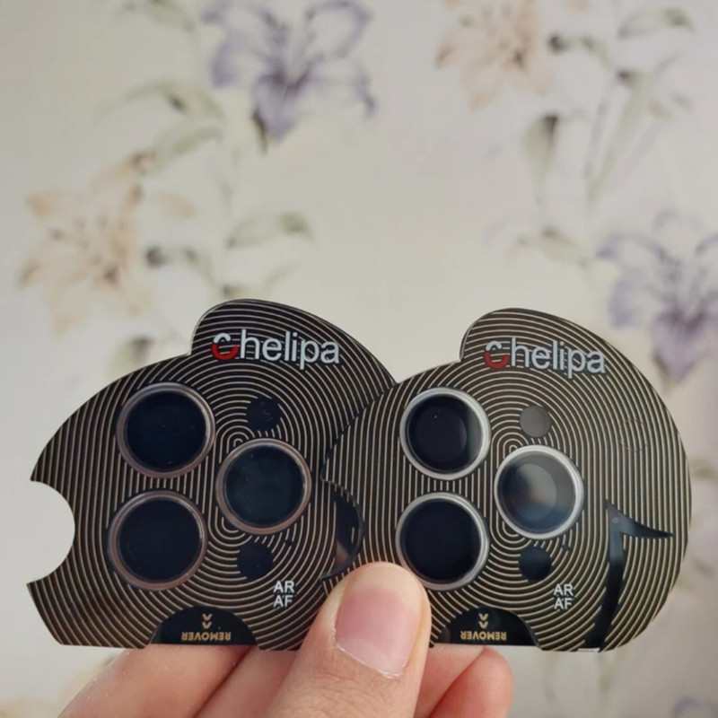 محافظ لنز دوربین شیشه ای اوجی مدل chelipa titanium مناسب برای گوشی موبایل اپل iPhone 16 Pro Max