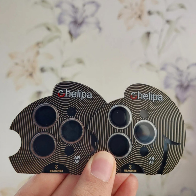 محافظ لنز دوربین شیشه ای اوجی مدل chelipa titanium مناسب برای گوشی موبایل اپل iPhone 16 Pro