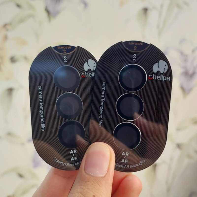 محافظ لنز دوربین شیشه ای اوجی مدل chelipa titanium مناسب برای گوشی موبایل سامسونگ Galaxy S25