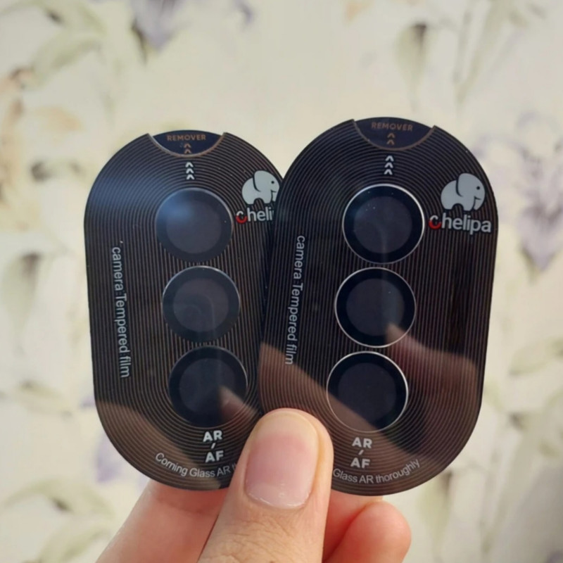 محافظ لنز دوربین شیشه ای اوجی مدل chelipa titanium مناسب برای گوشی موبایل سامسونگ Galaxy S25 Plus