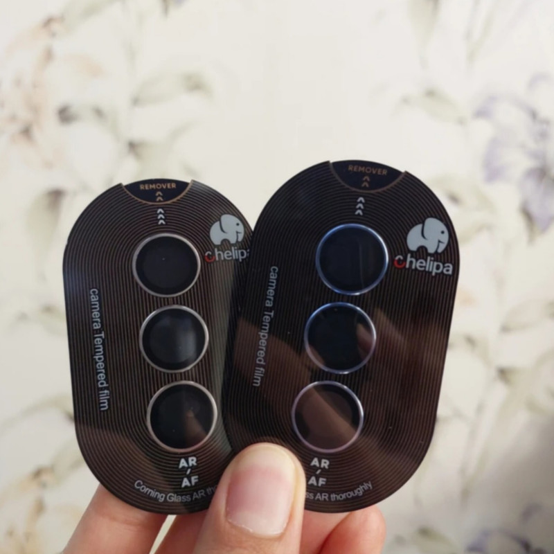 محافظ لنز دوربین شیشه ای اوجی مدل chelipa titanium مناسب برای گوشی موبایل سامسونگ Galaxy S24 FE