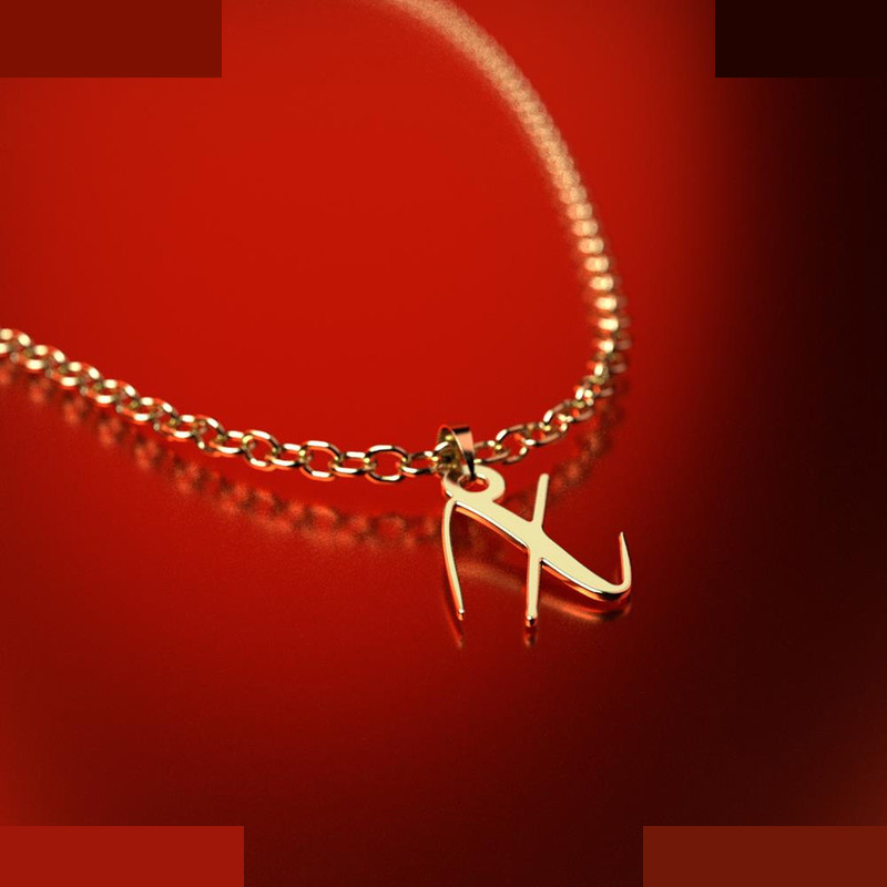 نیم ست طلا 18 عیار زنانه مدوپد مدل حرف x کد NA12333