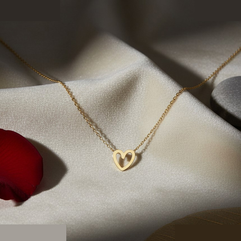 گردنبند طلا 18 عیار زنانه با زنجیر حلقهای (فلامینگو) گالری قو طلایی مدل قلب تو خالی اورانوس گردنبند طلا 18 عیار زنانه با زنجیر حلقهای (فلامینگو) گالری قو طلایی مدل قلب تو خالی اورانوس