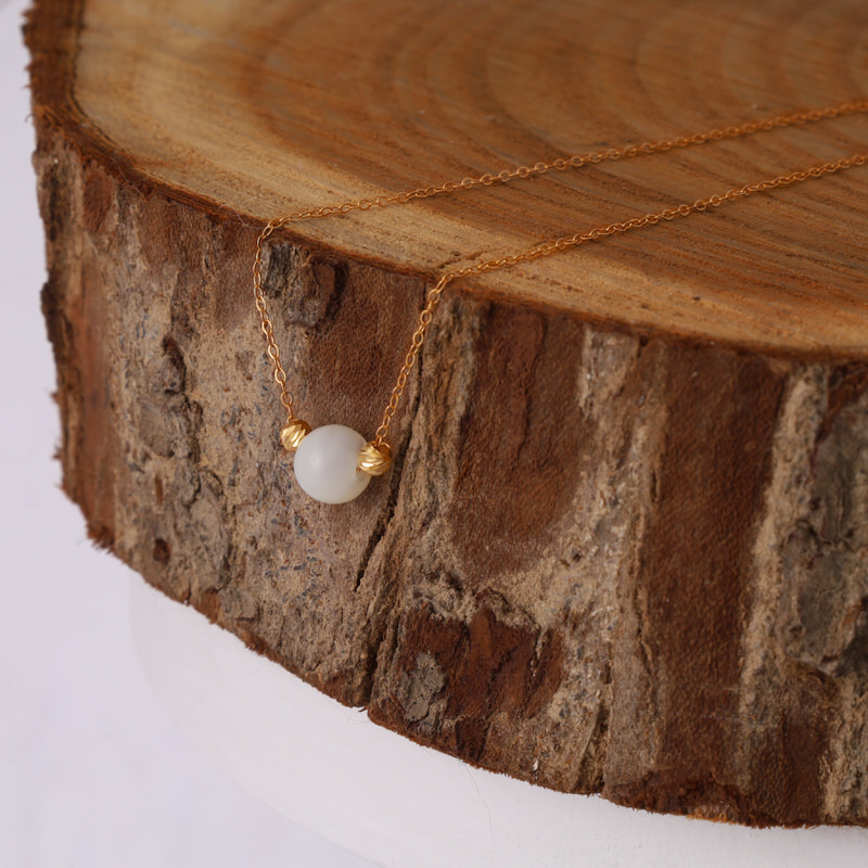 گردنبند طلا 18 عیار طرح مروارید و البرنادو