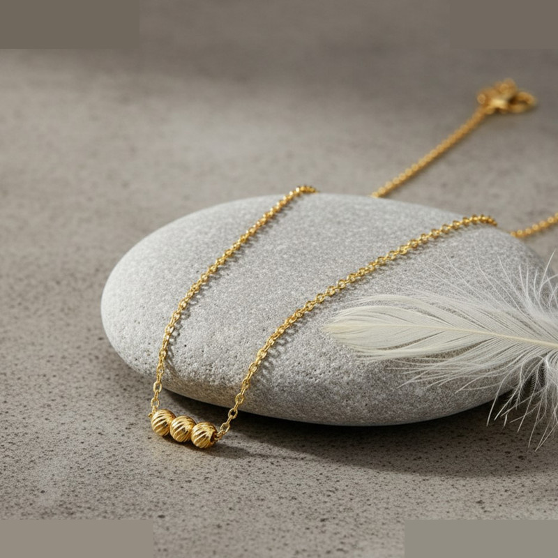 گردنبند طلا 18 عیار زنانه با زنجیر حلقهای (فلامینگو) گالری قو طلایی مدل سه گوی البرنادو گردنبند طلا 18 عیار زنانه با زنجیر حلقهای (فلامینگو) گالری قو طلایی مدل سه گوی البرنادو