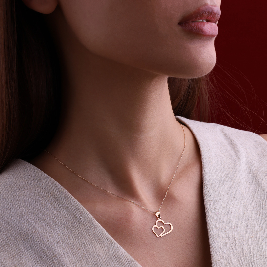 پلاک طلا 18عیار زنانه طرح دو قلب